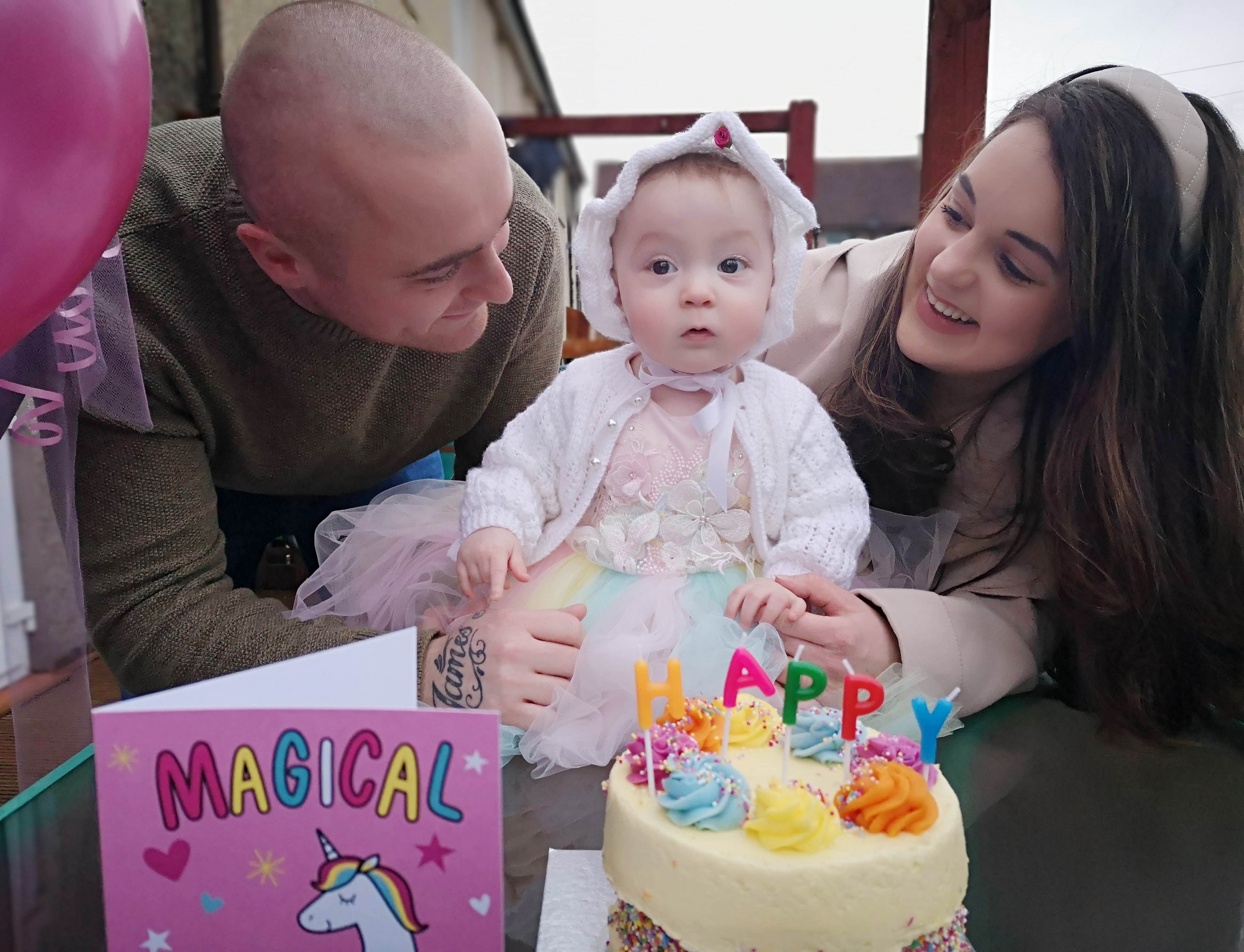 Tot who battled COVID as a baby is thriving as first birthday celebrations approach